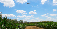 Photo of a drone above crops